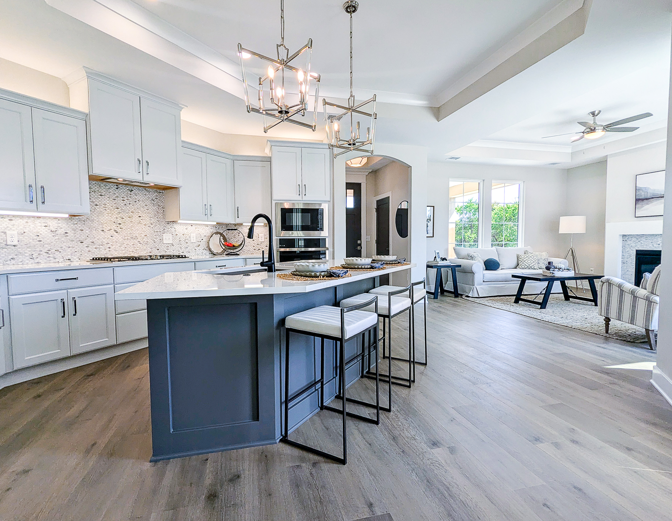 open floor plan kitchen island bar stools dining room